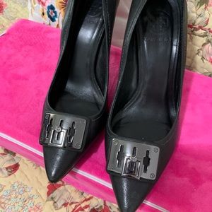 Black tori heels with neat silver hardware